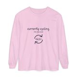 Currently cycling (the tank kind) long sleeve tee in Blossom, front view with the navy cycle arrows and doodle medaka print