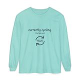 Currently cycling (the tank kind) long sleeve tee in Chalky Mint, front view with the navy cycle arrows and doodle medaka print