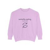 Currently cycling (the tank kind) premium crewneck sweatshirt in Orchid, front view with the navy cycle arrows and doodle medaka print