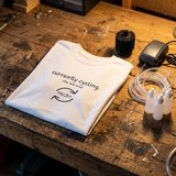 "Currently cycling. (the tank kind)" Unisex Heavyweight T-Shirt, photo 1