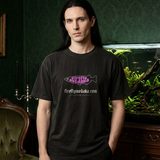 Man with long black hair wearing the Nightshade logo tee in Black, in a dark green Victorian parlor with a large planted aquarium