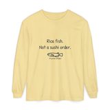 Rice fish, not a sushi order long sleeve tee in Butter, front view with the navy print and one unimpressed hand-drawn medaka